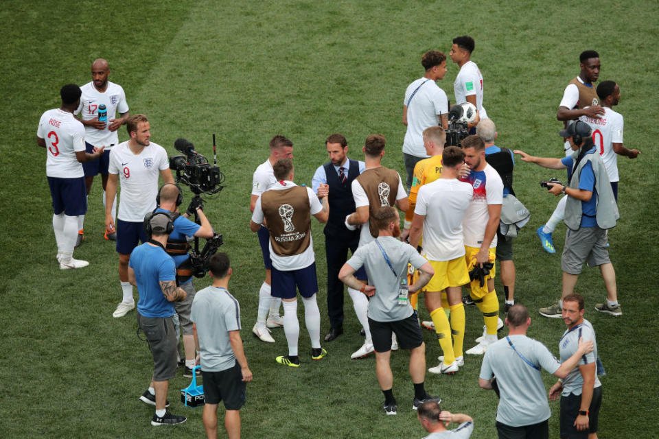 <p>England players and staff celebrate their win over Panama </p>