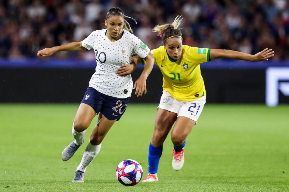 #20 Delphine Cascarino of France competes for the ball with #21 Monica of Brazil during the 2019 FIFA Women's World Cup France Round Of 16 match between France and Brazil at Stade Oceane on June 23, 2019 in Le Havre, France. (Photo by Zhizhao Wu/Getty Images)