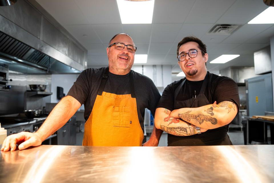 Wilson's Orchard culinary director Matt Steigerwald, left, and chef Lenny Trapane work in the kitchen at Ciderhouse Restaurant at Wilson's Orchard's new Cumming location.