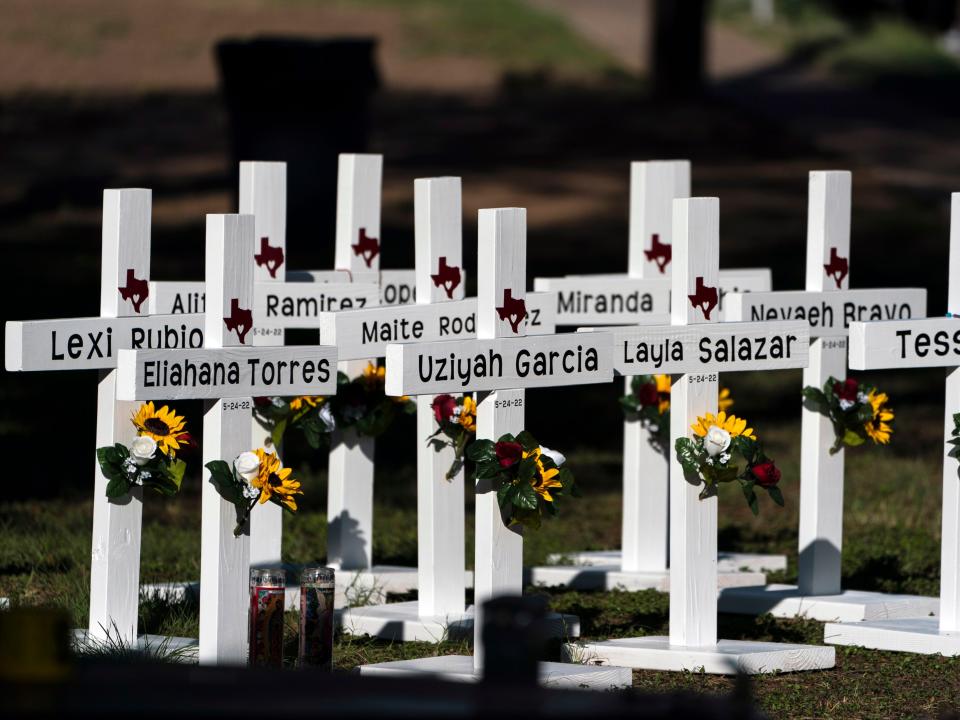 Crosses with the names of Tuesday's shooting victims are placed outside Robb Elementary School in Uvalde, Texas, Thursday, May 26, 2022.