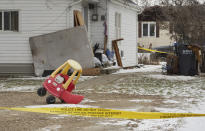 The scene of an ongoing investigation regarding five deaths in southern Manitoba, in Carman, Manitoba, Monday, Feb. 12, 2024. A Canadian man has been charged with five counts of first-degree murder in the deaths of his wife, three young children and a 17-year-old female relative, authorities said Monday. (David Lipnowski/The Canadian Press via AP)