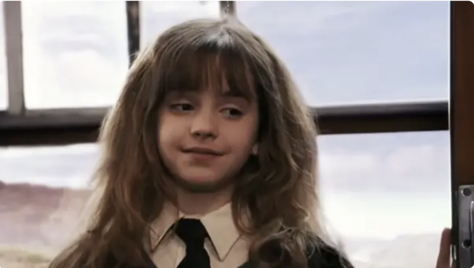 Young Emma as Hermione, not smiling