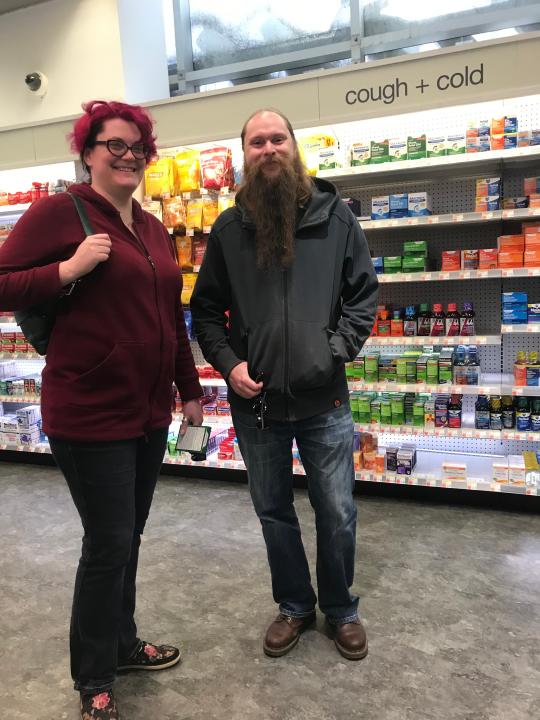 Carla Ayles, 34, and Stephen Oleson, 38, of Edmonton, Canada. In preparation for their flight home Monday night, they went to the CVS at the southern tip of Times Square so Ayles could buy some decongestant. “I think it’s just my asthma. But it’s hard to breathe, and I want to make sure they’ll let us back in” to Canada, Ayles said.