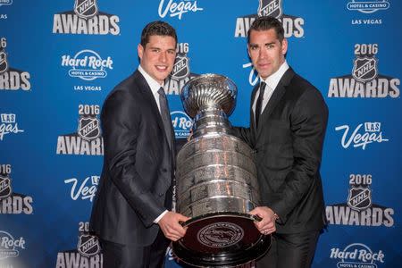 Jun 22, 2016; Las Vegas, NV, USA; Sidney Crosby and Pascal Dupuis walk the red carpet during the 2016 NHL Awards at Hard Rock Hotel and Casino. Mandatory Credit: Joshua Dahl-USA TODAY Sports