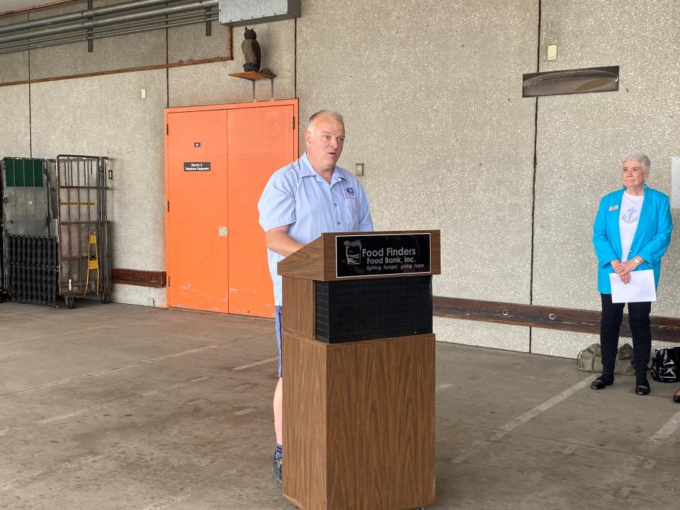 Jeff Chilcott, letter carrier for the South Street post office, speaks about the 31st annual Stamp Out Hunger Food Drive. May 12, 2023