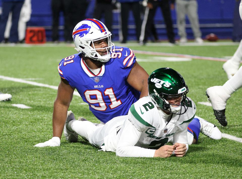 Ed Oliver takes down Jets quarterback Zack Wilson last year at Highmark Stadium.