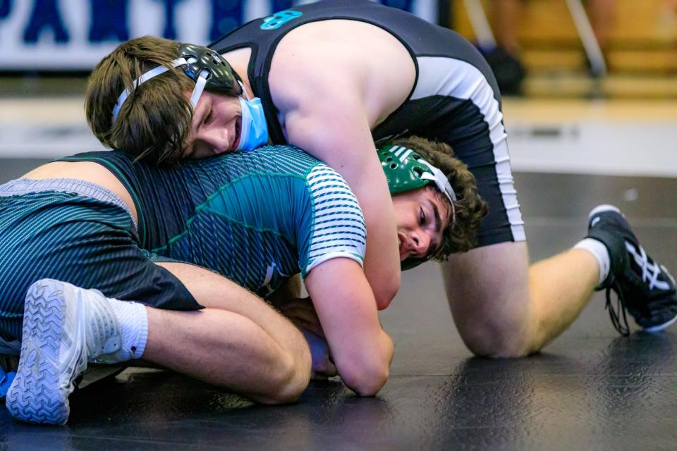 At 182 pounds, Plymouth South's Zach Proctor competed with Duxbury's Vince Player during a match in June 2021.
