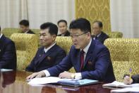 Yun Jong Ho, right, North Korean external economic relations minister, hold a talk with Oleg Kozhemyako, not in photo, governor of the Primorye region in the Russian Far East, at the Mansudae Assembly Hall in Pyongyang, on Tuesday, Dec. 12, 2023. Senior North Korean economic officials met with the governor of a Russian region along the Pacific coast for discussions on boosting economic cooperation between the countries, North Korean state media said Wednesday.(AP Photo/Cha Song Ho)