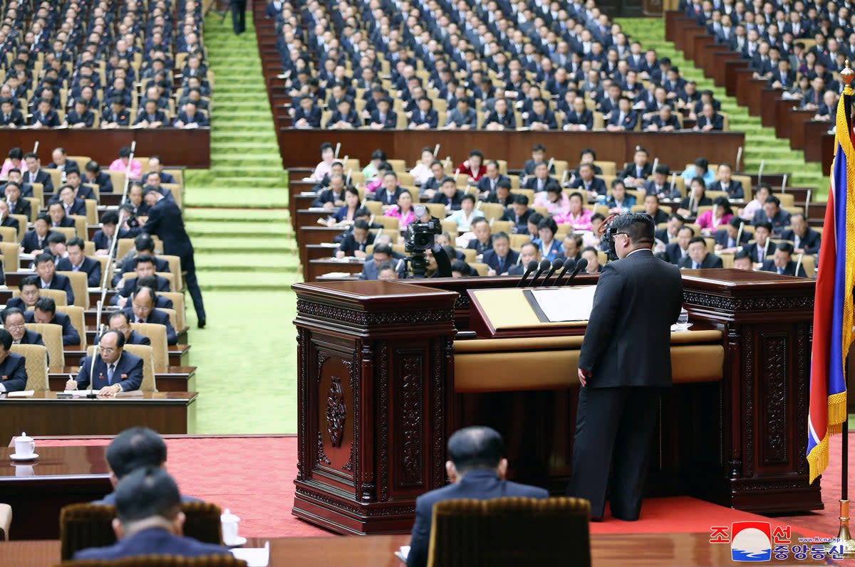 Kim before the 14th session of the assembly (KCNA VIA KNS/AFP/Getty)