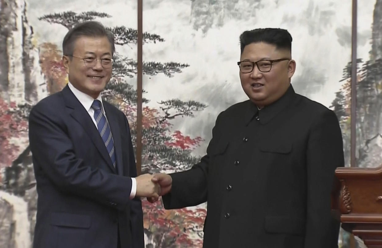 Kim Jong-Un with South Korean president Moon Jae-in (AP)