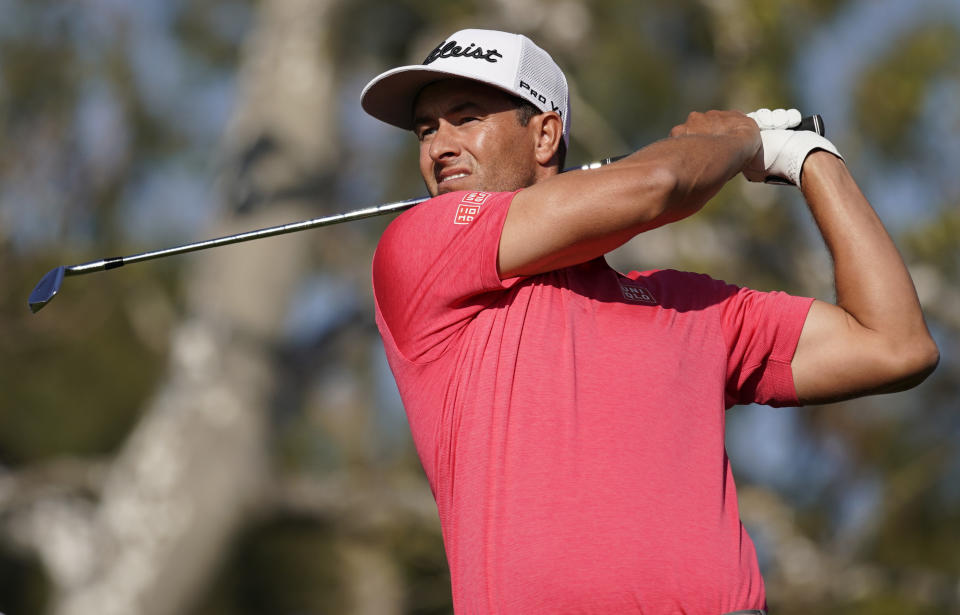 Adam Scott, of Australia, tees off on the 16th hole during the final round of the Genesis Invitational golf tournament at Riviera Country Club, Sunday, Feb. 16, 2020, in the Pacific Palisades area of Los Angeles. (AP Photo/Ryan Kang)