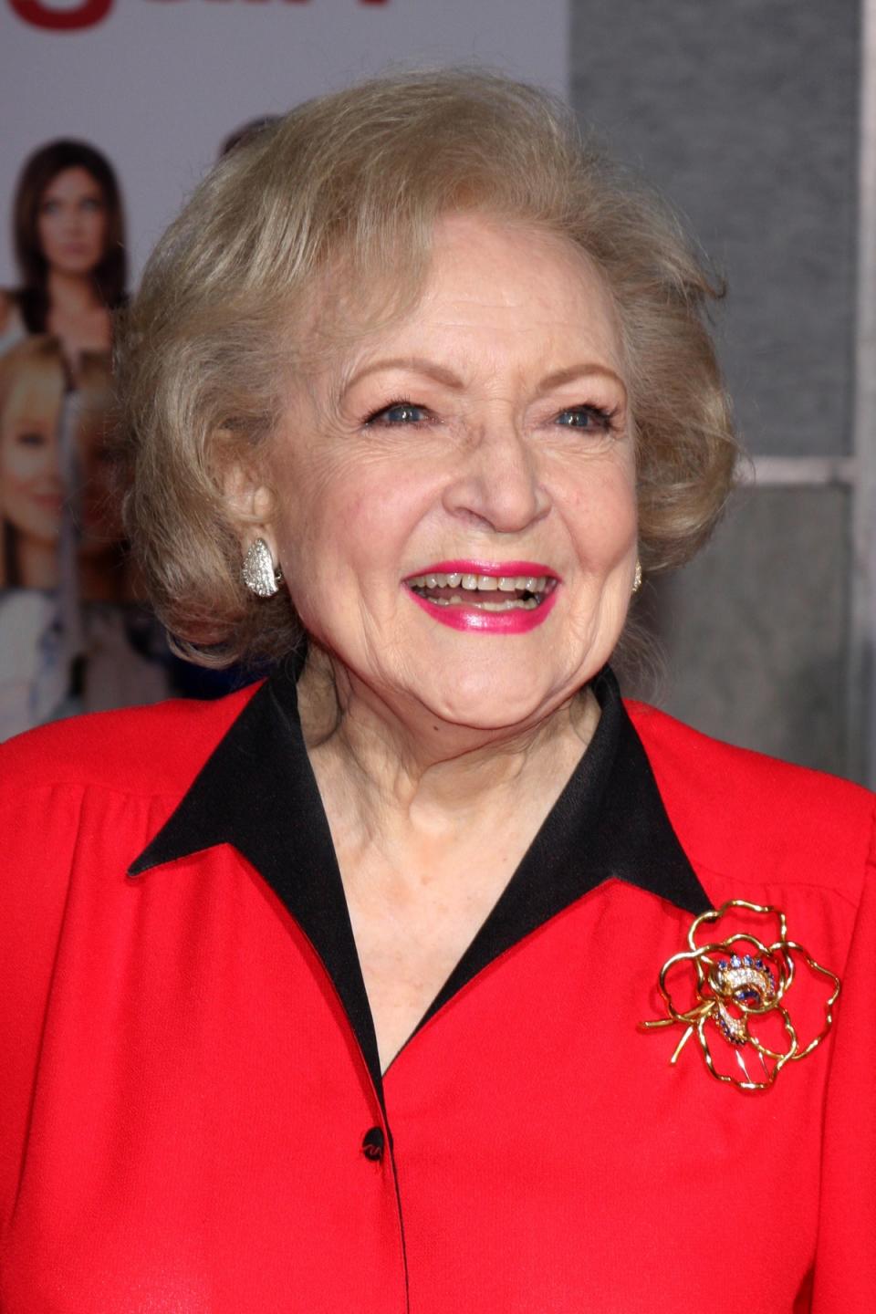 Betty White arrives at the 