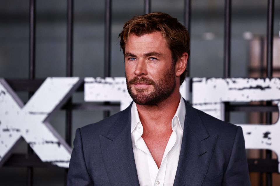 Actor Chris Hemsworth poses for a photo at the premiere of the film "Extraction 2" in New York.