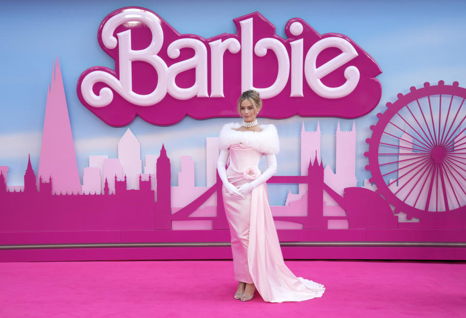 FILE - Margot Robbie poses for photographers upon arrival at the premiere of the film 'Barbie' on Wednesday, July 12, 2023, in London. The Associated Press reported on stories circulating online incorrectly claiming the “Barbie” movie raised more money in one day than Florida Gov. Ron DeSantis has his entire life. (Scott Garfitt/Invision/AP, File)