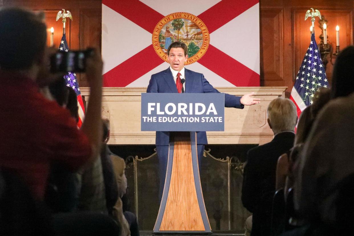 <span>Ron DeSantis speaks before signing legislation on 15 May 2023 blocking public colleges from using federal or state funding for DEI programs.</span><span>Photograph: Douglas R Clifford/AP</span>