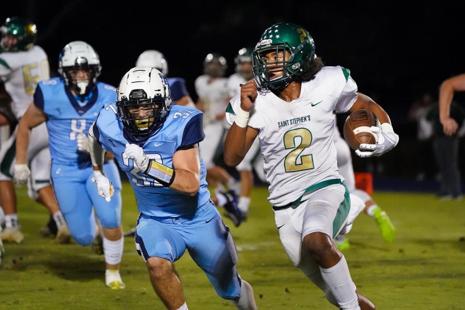 St. Stephen's Episcopal's Evan Brown runs up field during first half action Friday night against Out-of-Door Academy.