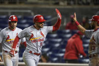 St Louis Cardinals' Paul DeJong (11) celebrates his grand slam with teammates during the fifth inning of a baseball game against the Washington Nationals at Nationals Park, Monday, April 19, 2021, in Washington. (AP Photo/Alex Brandon)