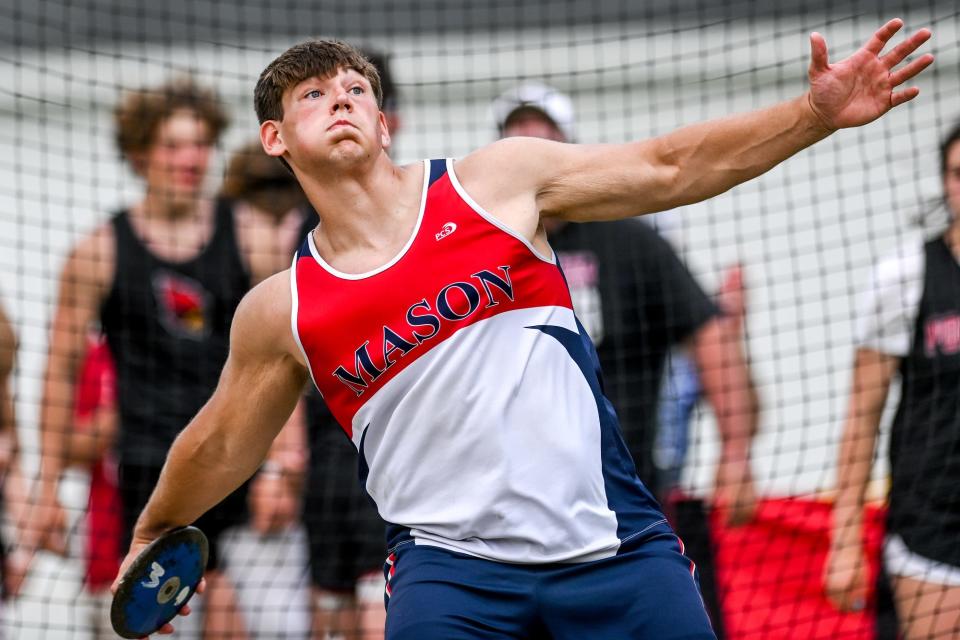 Mason's Connor Williamson competes in the discus throw event during the regional track meet on Friday, May 20, 2022, at Mason High School.