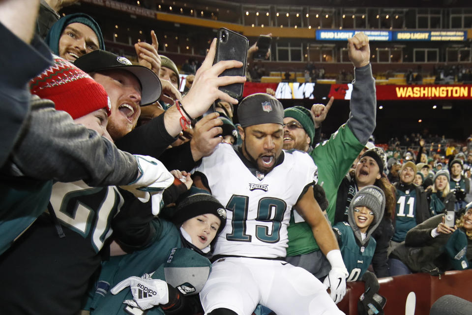 Philadelphia Eagles wide receiver Golden Tate (19) celebrates with fans after the NFL football game between the Washington Redskins and the Philadelphia Eagles, Sunday, Dec. 30, 2018 in Landover, Md. The Eagles defeated the Redskins 24-0. (AP Photo/Alex Brandon)