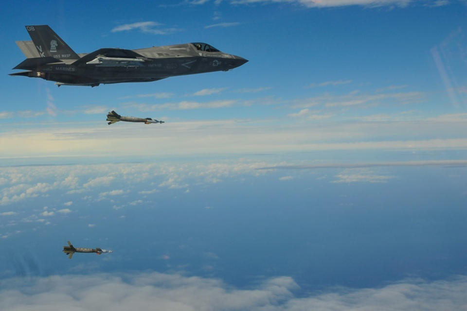 In this Feb. 3, 2019, photo released by U.S. Marine's 31st Marine Expeditionary Unit, an F-35B Lightning II with the F-35B detachment of Medium Marine Tiltrotor Squadron 262 (Reinforced) releases Guided Bomb Units on-target above the Pacific Ocean. The training mission demonstrated an “increase in lethality and integrated amphibious capability,” it quoted Col. Robert Brodie, commanding officer of the 31st Marine Expeditionary Unit as saying. (Maj. Jesse Peppers/U.S. Marine Corps via AP)