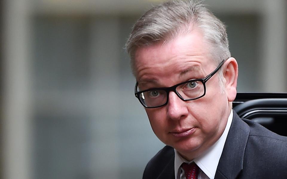 Michael Gove has warned Nicola Sturgeon to stop showboating - Credit: EPA