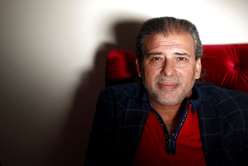 Khaled Youssef, member of the Egyptian parliament and film director, poses for a portrait inside his private appartment in Paris