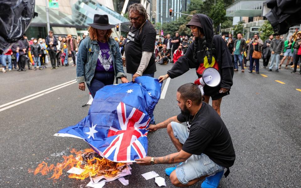 Australian 'Abolish the Monarchy' group burns Union Jack on national day of mourning for late Queen - RUSSELL FREEMAN/EPA-EFE /Shutterstock 