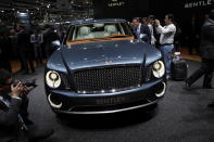 After months of rumors, Bentley revealed today a concept for its first sport utility vehicle ever: the 600-hp Bentley EXP 9 F. When it comes to vehicles for the wealthiest people in the world, restraint is so last century. With ultra-luxury vehicle sales rising on strong demand from China and the Middle East, the SUV would make the most financial sense as an addition. Given that the Continental starts around $190,000 and the Mulsanne around $280,000, it's easy to imagine a Bentley SUV with a sticker of about $250,000. Powered by a twin-turbo W-12 capable of 600 hp and 590 ft-lbs. of torque, Bentley says the EXP 9 would rank among the fastest vehicles of its kind. All that motive force gets to the ground through an 8-speed transmission and all-wheel-drive system turning 23-inch chrome wheels that are as bling-y as anything from Tire Rack. Inside lies the usual assortment of hand-stitched leathers, wood veneers and one-percentery touches like a split tailgate that folds down to reveal a custom dining set.