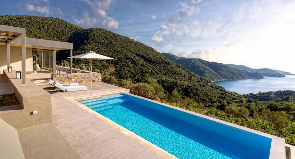 a swimming pool next to a building