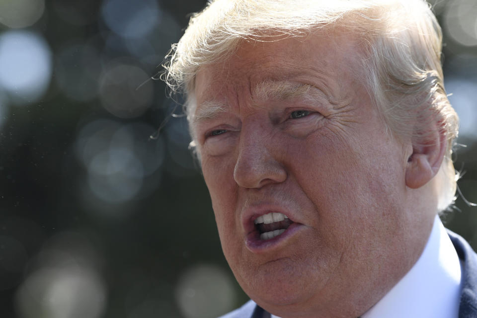 FILE - In this Saturday, June 22, 2019, file photo President Donald Trump speaks to reporters on the South Lawn of the White House in Washington. The economic component of the Trump administration's long-awaited Mideast peace plan drew chilly responses from regional allies Sunday, June 23, two days before it was to be discussed at a conference in the Gulf. (AP Photo/Susan Walsh, File)