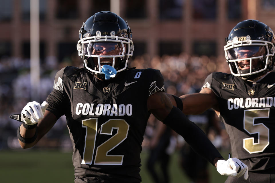 BOULDER, COLORADO - AUGUST 29: Travis Hunter #12 of the Colorado Buffaloes celebrates scoring a touchdown during the first quarter against the North Dakota State Bison at Folsom Field on August 29, 2024 in Boulder, Colorado. (Photo by Andrew Wevers/Getty Images)