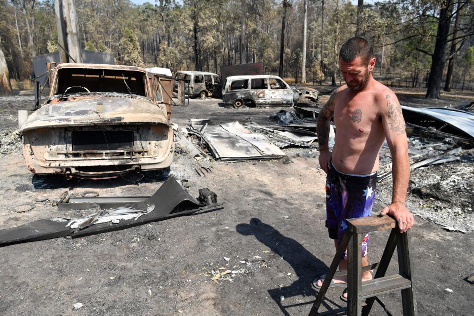 Danny Wearne surveys the bushfire damage to his property on November 13, 2019, in Rainbow Flat, Australia. Catastrophic fire conditions, the highest possible level of bushfire danger, have eased across greater Sydney, Illawarra and Hunter areas thanks to a slight cool change, however, dozens of bushfires are still burning.