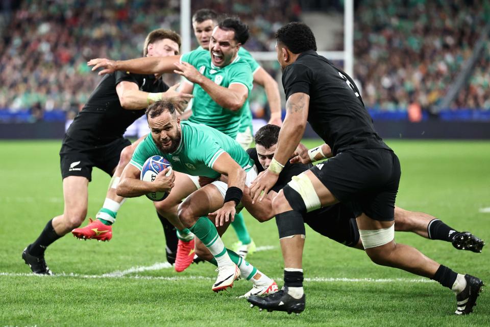 Jamison Gibson-Park charges to the line to give Ireland a second try (AFP via Getty Images)