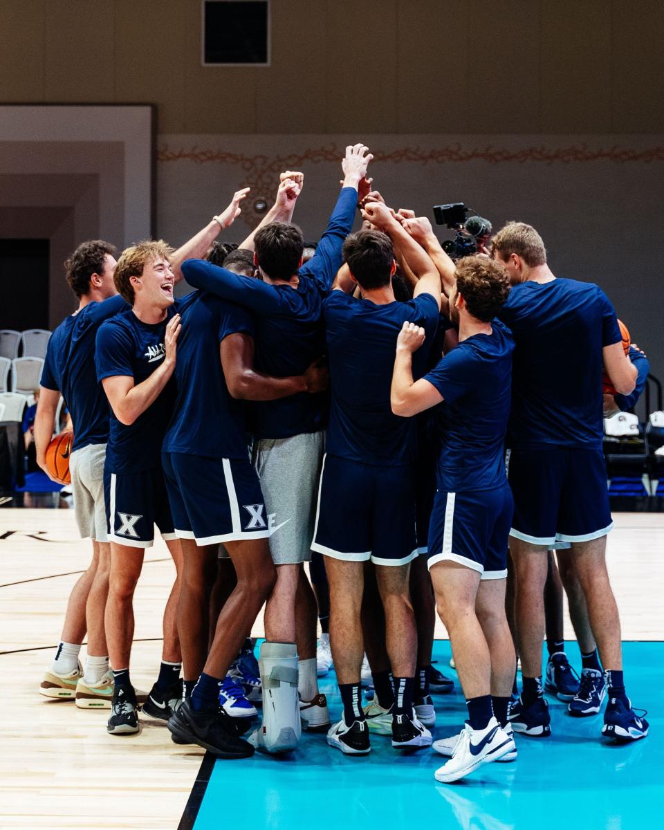 Xavier basketball breaks down its huddle before playing the University of Victoria in the Baha Mar Hoops Summer League on Aug. 8, 2023 in Nassau, Bahamas.