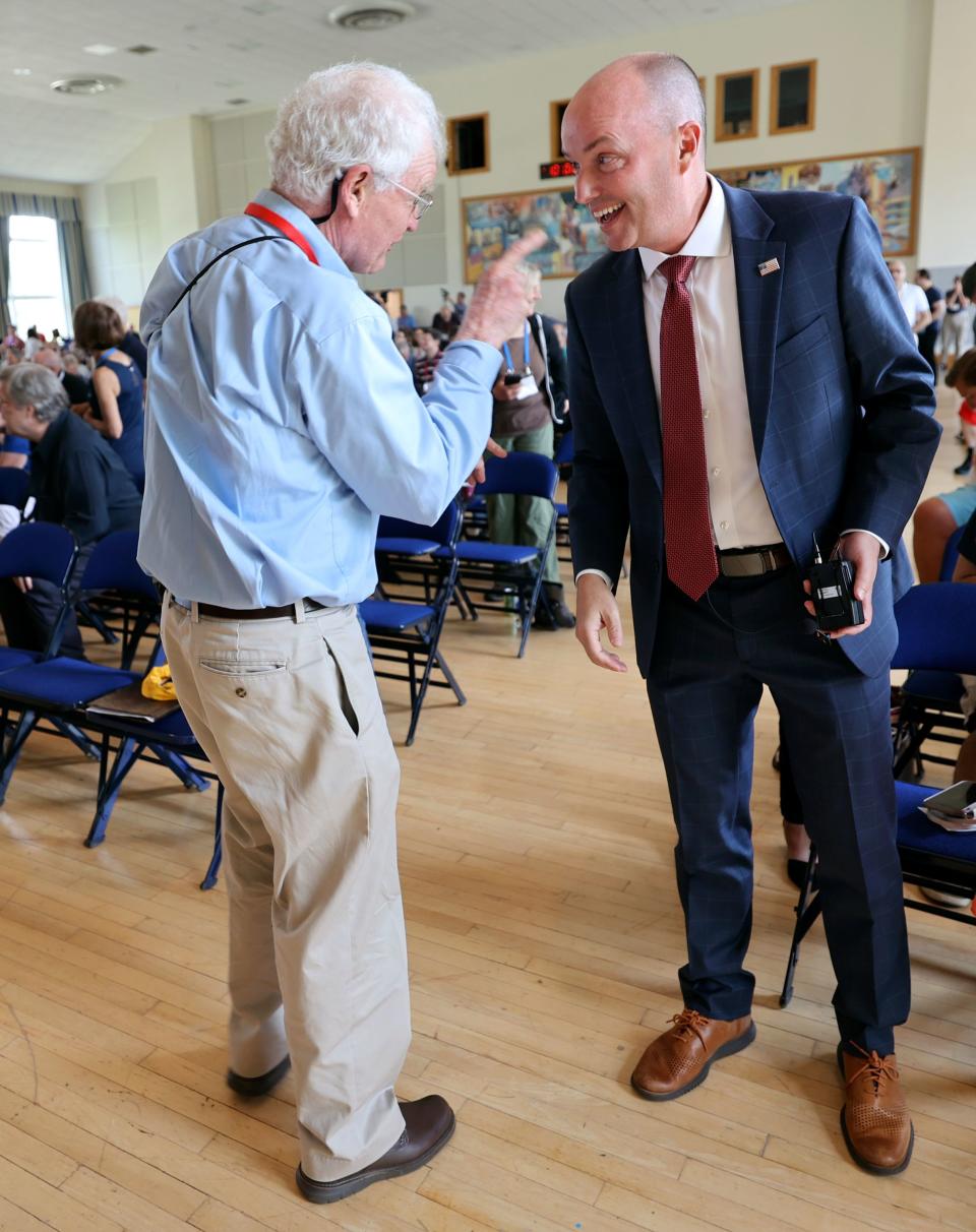 Dr. Doug Teschner, Braver Angels New England regional coordinator and former New Hampshire GOP state legislator, talks to Gov. Spencer Cox at the Braver Angels National Convention at Gettysburg College in Gettysburg, Pa., on Saturday, July 8, 2023. | Kristin Murphy, Deseret News