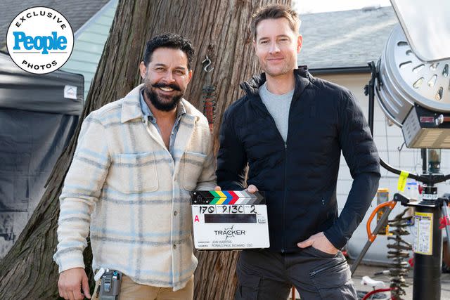 <p>Michael Courtney/CBS</p> Jon Huertas (left) with Justin Hartley on the set of Tracker