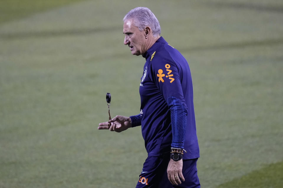 Brazil's head coach Tite attends a training session at the Grand Hamad stadium in Doha, Qatar, Tuesday, Nov. 29, 2022. Brazil will face Cameroon in a group G World Cup soccer match on Dec. 2. (AP Photo/Andre Penner)