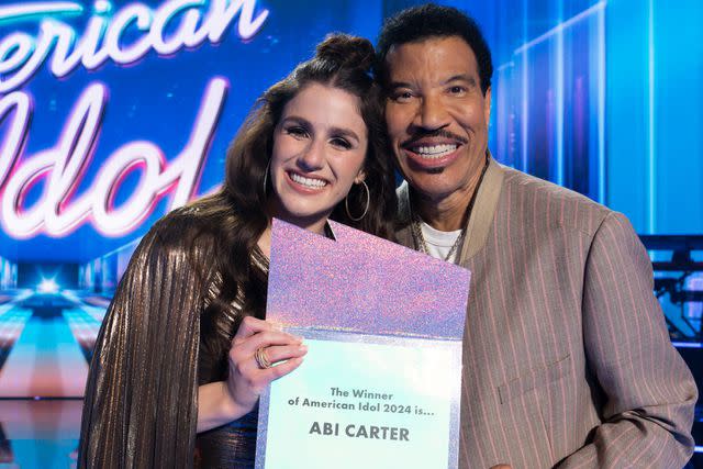 <p>Disney/Eric McCandless</p> Abi Carter and Lionel Richie on May 19, 2024