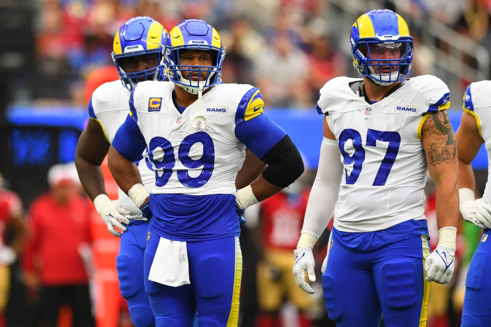 INGLEWOOD, CA - SEPTEMBER 17: Los Angeles Rams defensive tackle Aaron Donald (99) and Los Angeles Rams linebacker Michael Hoecht (97) look on during the NFL game between the San Francisco 49ers and the Los Angeles Rams on September 17, 2023, at SoFi Stadium in Inglewood, CA. (Photo by Brian Rothmuller/Icon Sportswire via Getty Images)