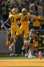 Baylor tight end Ben Sims (86) celebrates his touchdown with wide receiver R.J. Sneed (0) during the first half of an NCAA college football game against Iowa State, Saturday, Sept. 25, 2021, in Waco, Texas. (AP Photo/Jim Cowsert)