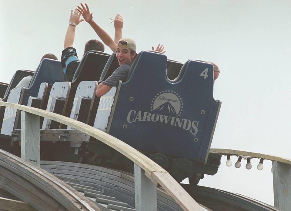 The chance to ride backwards is a crowd-pleaser on the “Thunder Road” roller coaster at Carowinds, seen in this 1998 file photo.