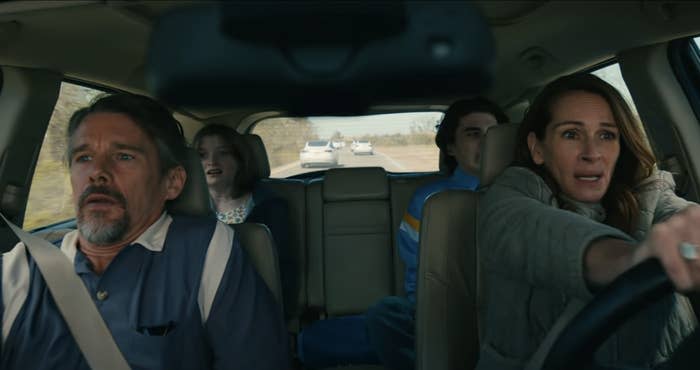 Julia Roberts drives with three passengers, including Ethan Hawke in a scene from Leave the world behind