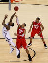 NEW ORLEANS, LA - MARCH 31: Thomas Robinson #0 of the Kansas Jayhawks puts up a shot over Jared Sullinger #0 of the Ohio State Buckeyes during the National Semifinal game of the 2012 NCAA Division I Men's Basketball Championship at the Mercedes-Benz Superdome on March 31, 2012 in New Orleans, Louisiana. (Photo by Ronald Martinez/Getty Images)