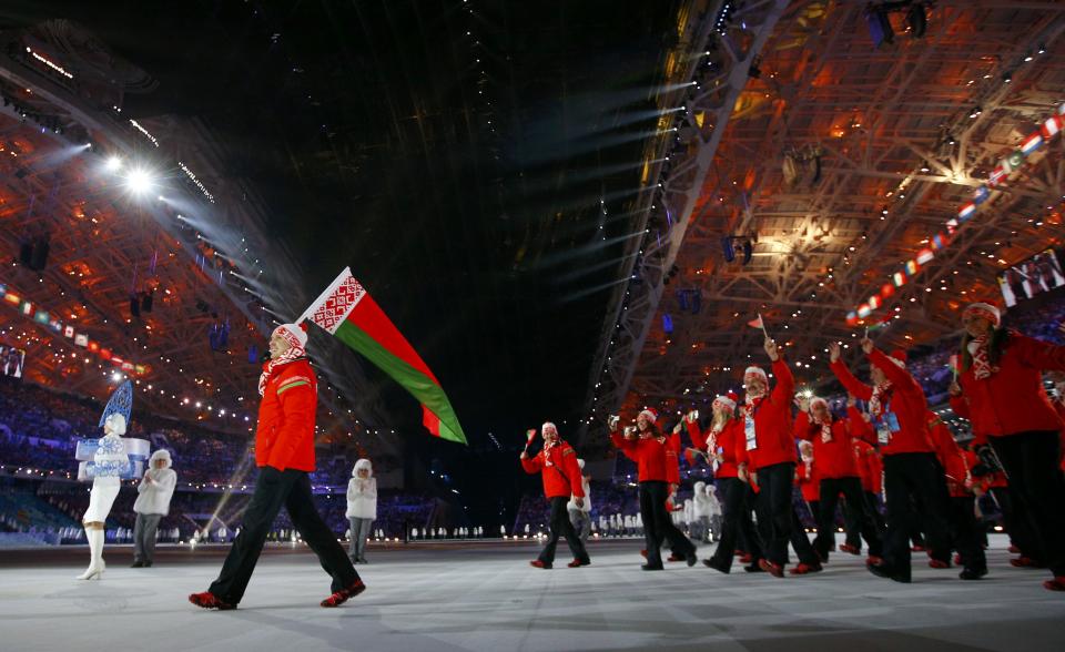 Belarus' flag-bearer Alexei Grishin leads his country's contingent during the opening ceremony of the 2014 Sochi Winter Olympic Games February 7, 2014. REUTERS/Brian Snyder (RUSSIA - Tags: SPORT OLYMPICS)