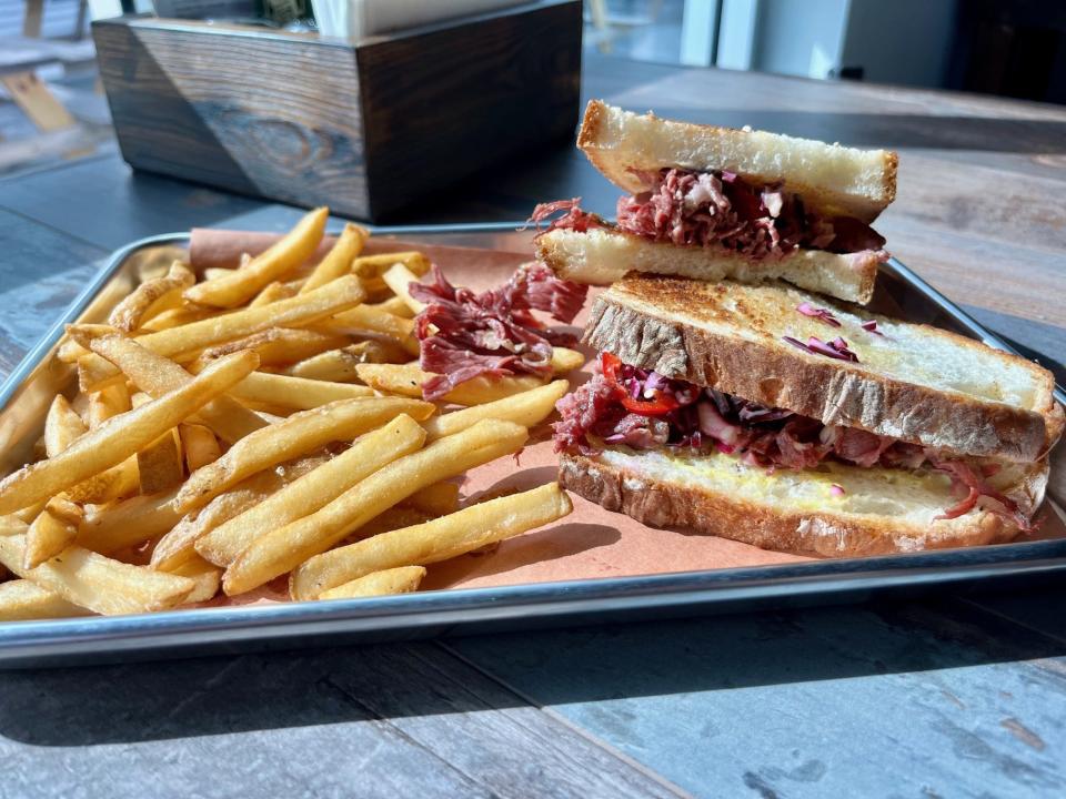 The pastrami sandwich from Roast, located inside The Causeway, comes with pickled red cabbage, pickled chilies and a mustard and horseradish spread.