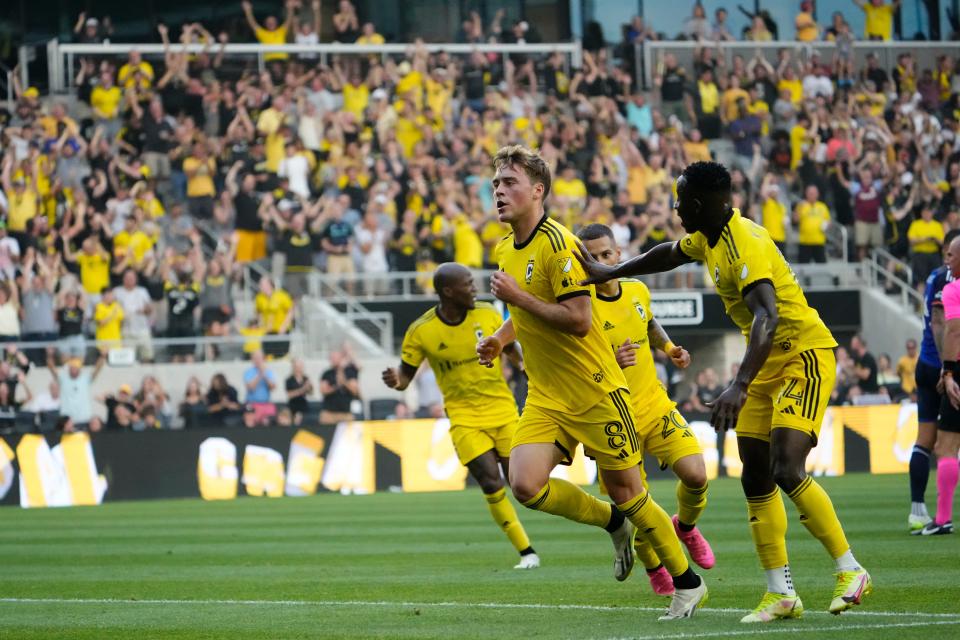 Crew midfielder Aidan Morris (8) celebrates scoring a goal on Sunday.