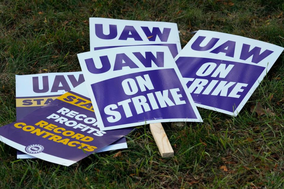 United Auto Workers signs for a strike are shown at the Stellantis Sterling Heights Assembly Plant, in Sterling Heights, Michigan (AP)