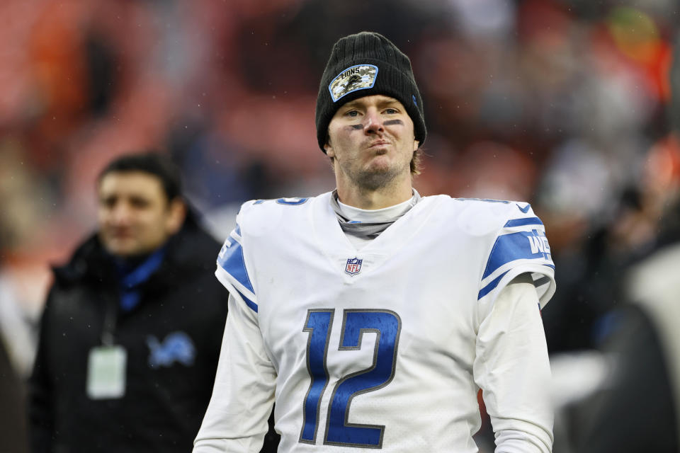 Detroit Lions quarterback Tim Boyle walks off the field after the Cleveland Browns won an NFL football game, Sunday, Nov. 21, 2021, in Cleveland. (AP Photo/Ron Schwane)