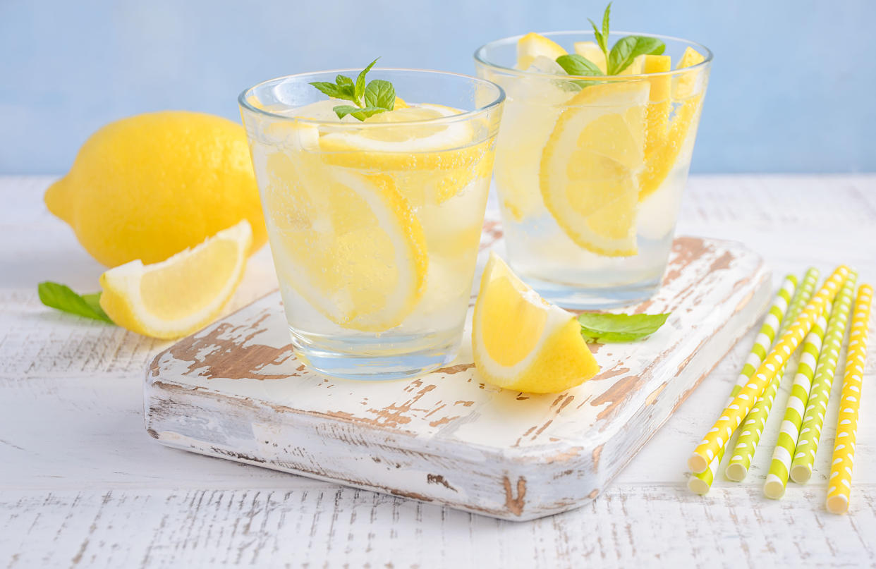 Flavoring water with citrus and herbs is a perfect way to enhance the flavor. (Photo: Getty Creative)