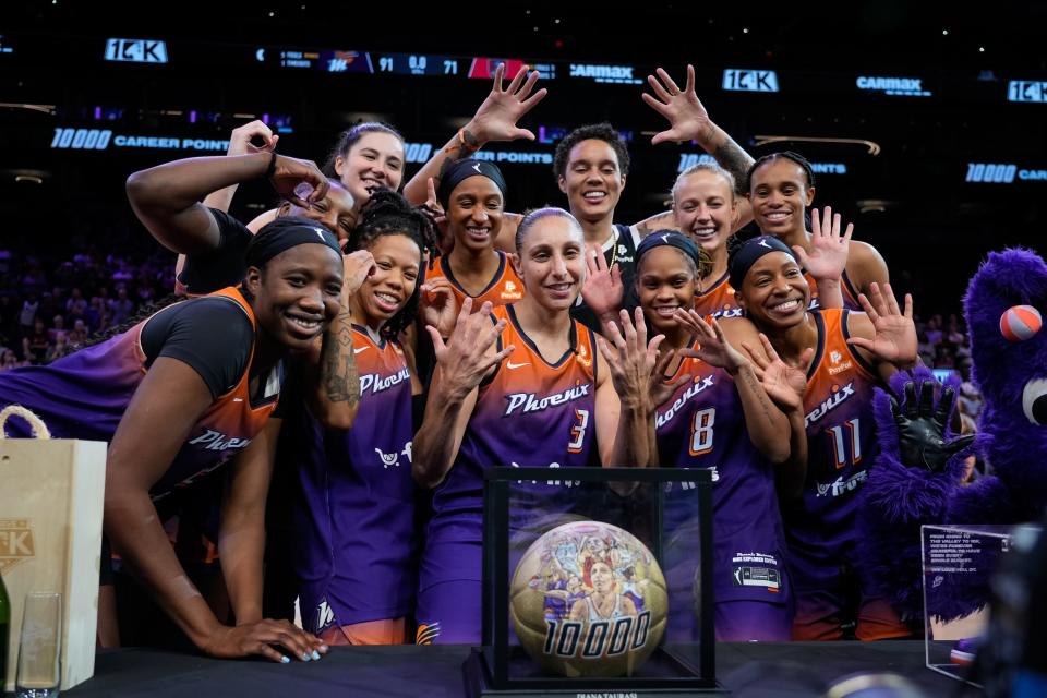 After a game against the Atlanta Dream, Phoenix Mercury celebrates Diana Taurasi reaching 10,000 total career points at Footprint Center on August 3, 2023, in Phoenix, AZ.